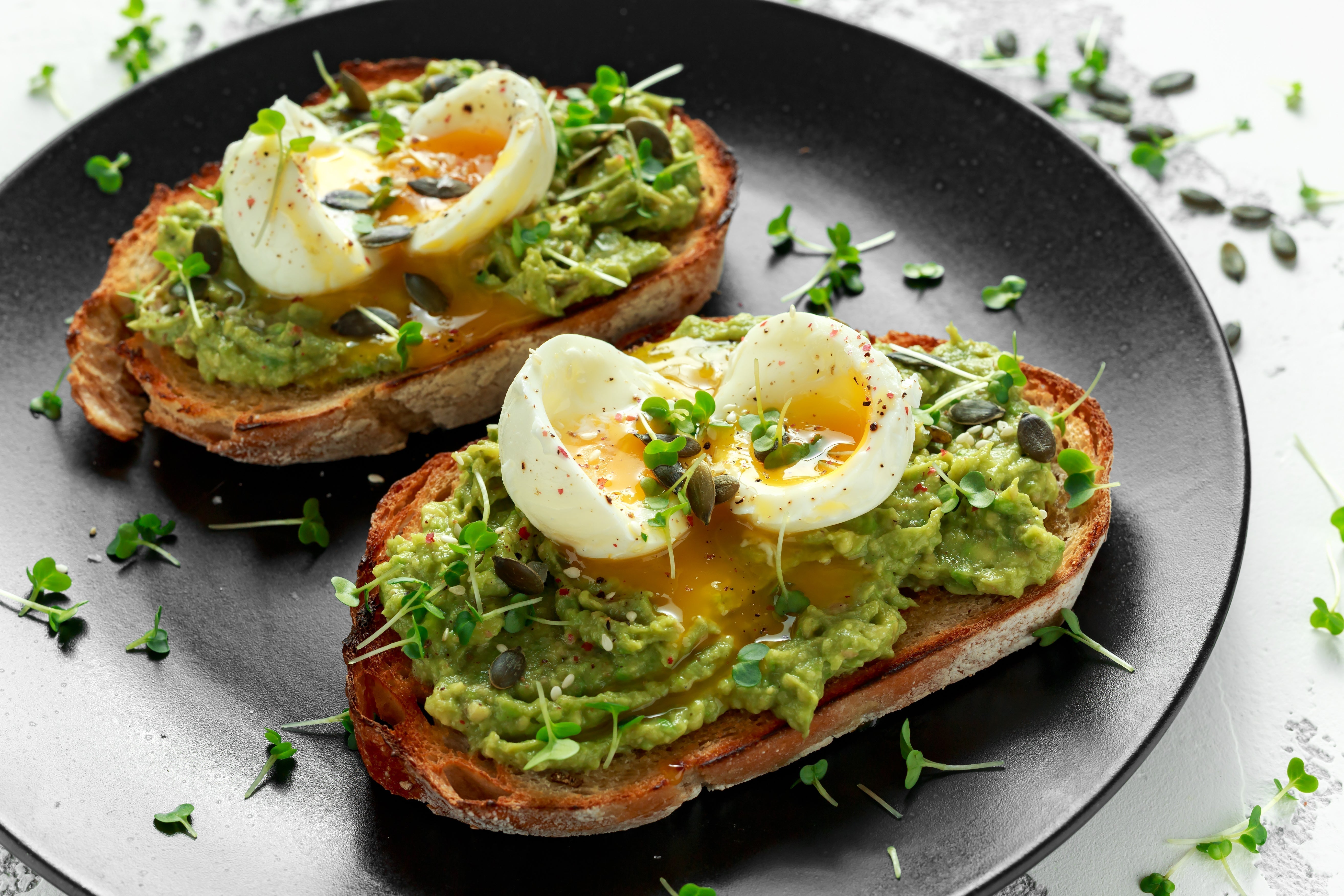 Avocado Toast with Soft-Boiled Eggs, Pumpkin Seeds, and Cress Salad