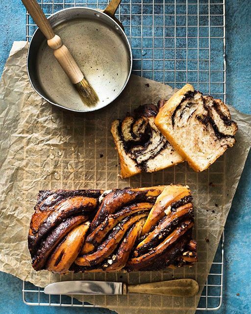 Chocolate babka loaf swirled with ARLO culinary argan oil, sliced and glazed for a rich, nutty, gourmet dessert