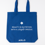 ARLO blue tote bag – Beauty in Nutrition with a single drizzle. Reusable cotton grocery bag, front with white branding