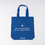ARLO blue tote bag – Beauty in Nutrition with a single drizzle. Reusable cotton grocery bag, front with white branding