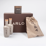 ARLO deluxe culinary argan oil gift set – two organic oil bottles, scented candle, linen pouch, brown gift box
