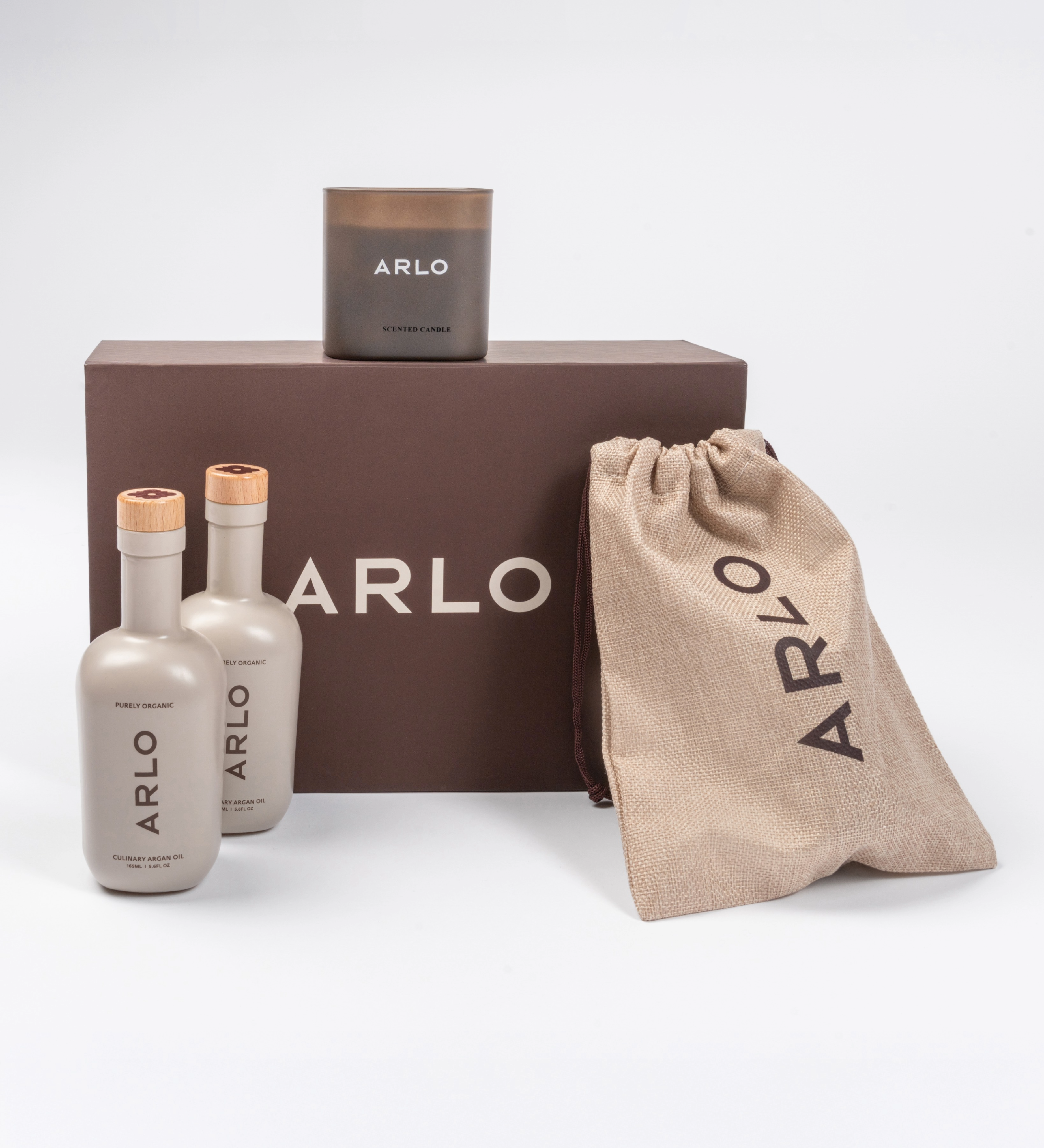 ARLO deluxe culinary argan oil gift set – two organic oil bottles, scented candle, linen pouch, brown gift box