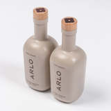 ARLO culinary argan oil duo set – luxury wooden caps, top angle